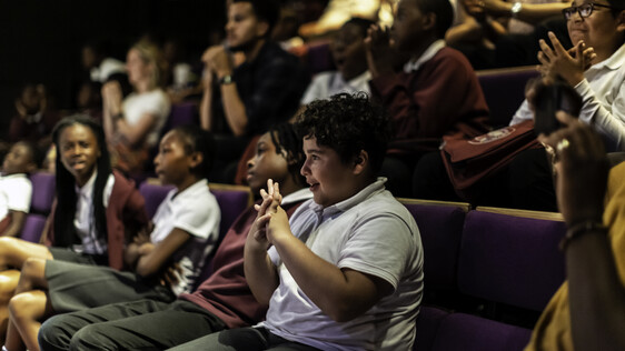 An audience of school children