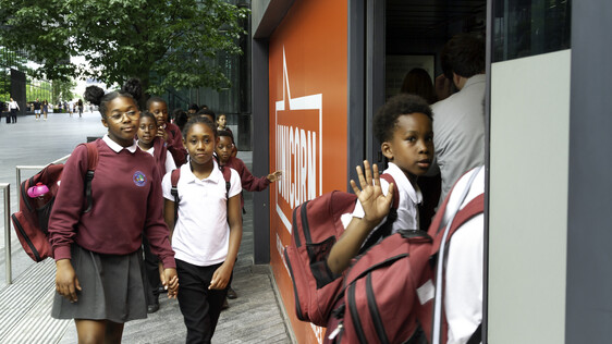 School children coming into the building